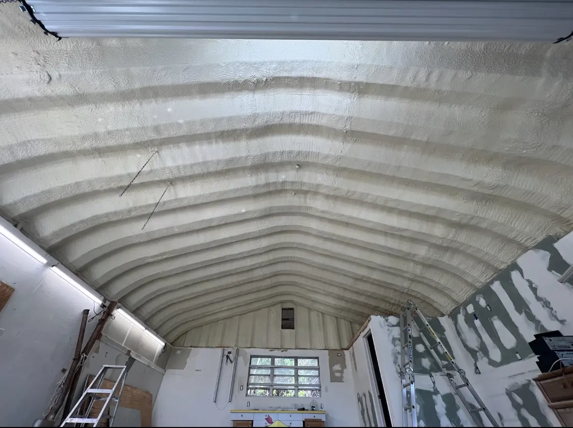 Spray polyurethane foam applied to the underside of a metal roof deck in Weehawken